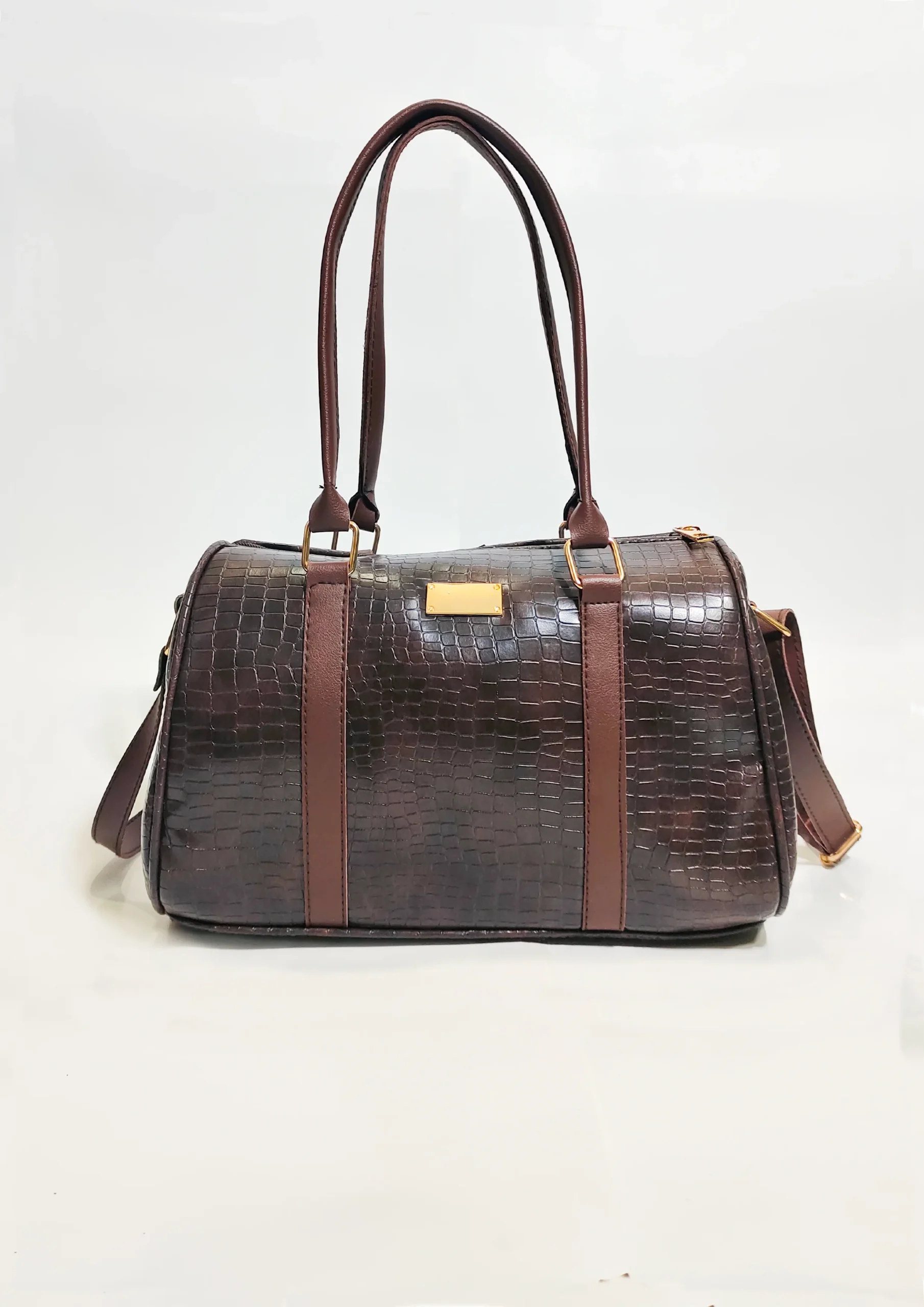 Ladiestravelhandbaginchoclatycolor Elegant genuine leather women's handbag in brown with premium craftsmanship, spacious compartments, adjustable shoulder strap, and modern stylish design.